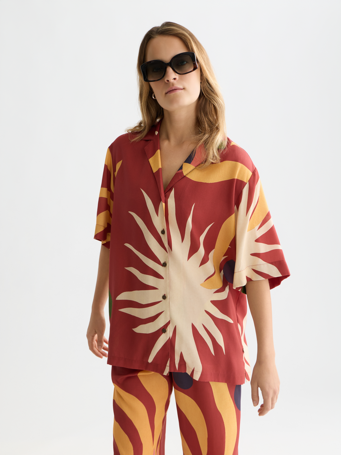 Printed short-sleeved shirt by Scotch & Soda featuring vibrant floral patterns and a casual fit.