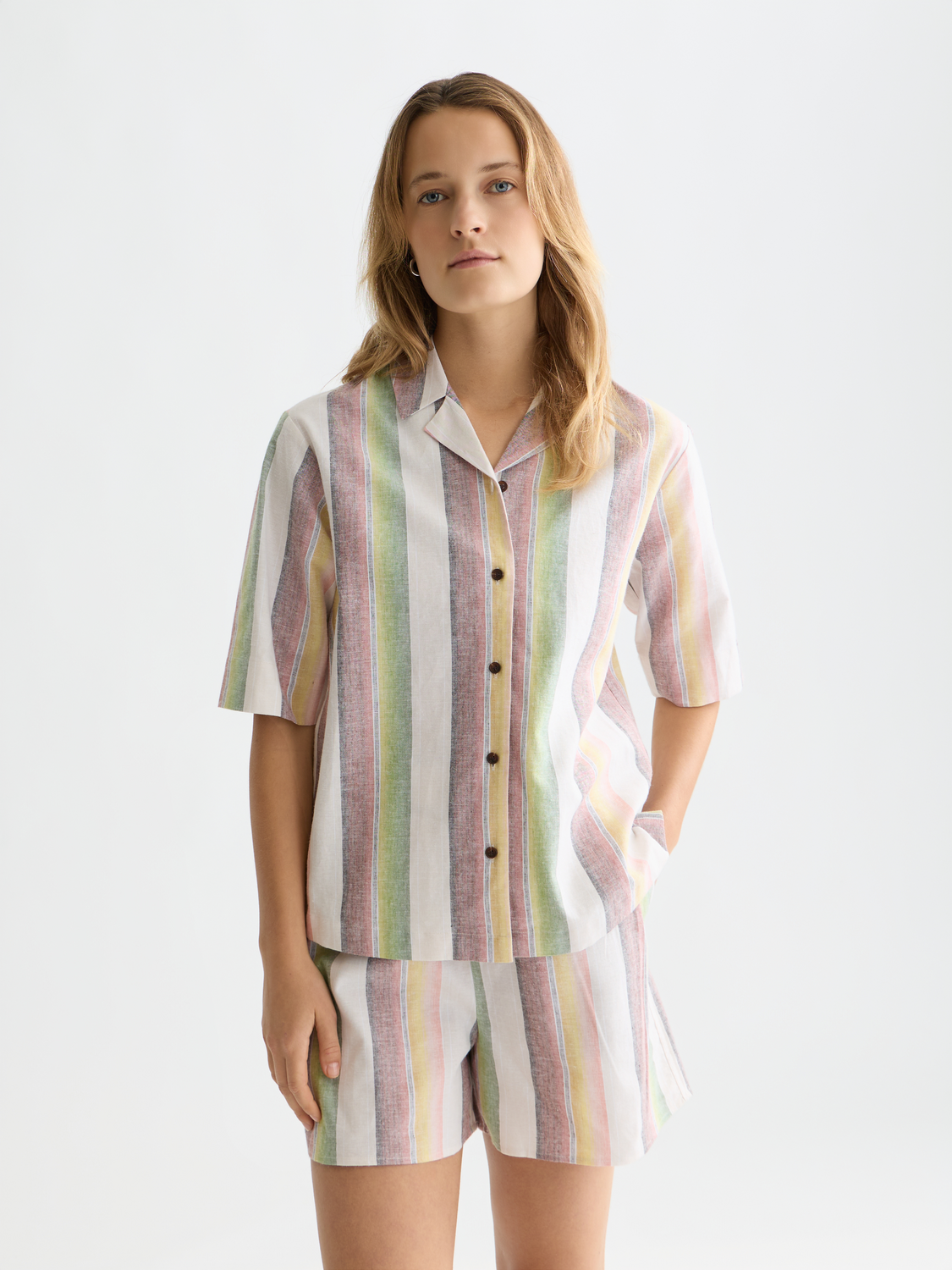 Striped Scotch & Soda short sleeve shirt featuring a classic design, with blue and white horizontal stripes and a button-up front.