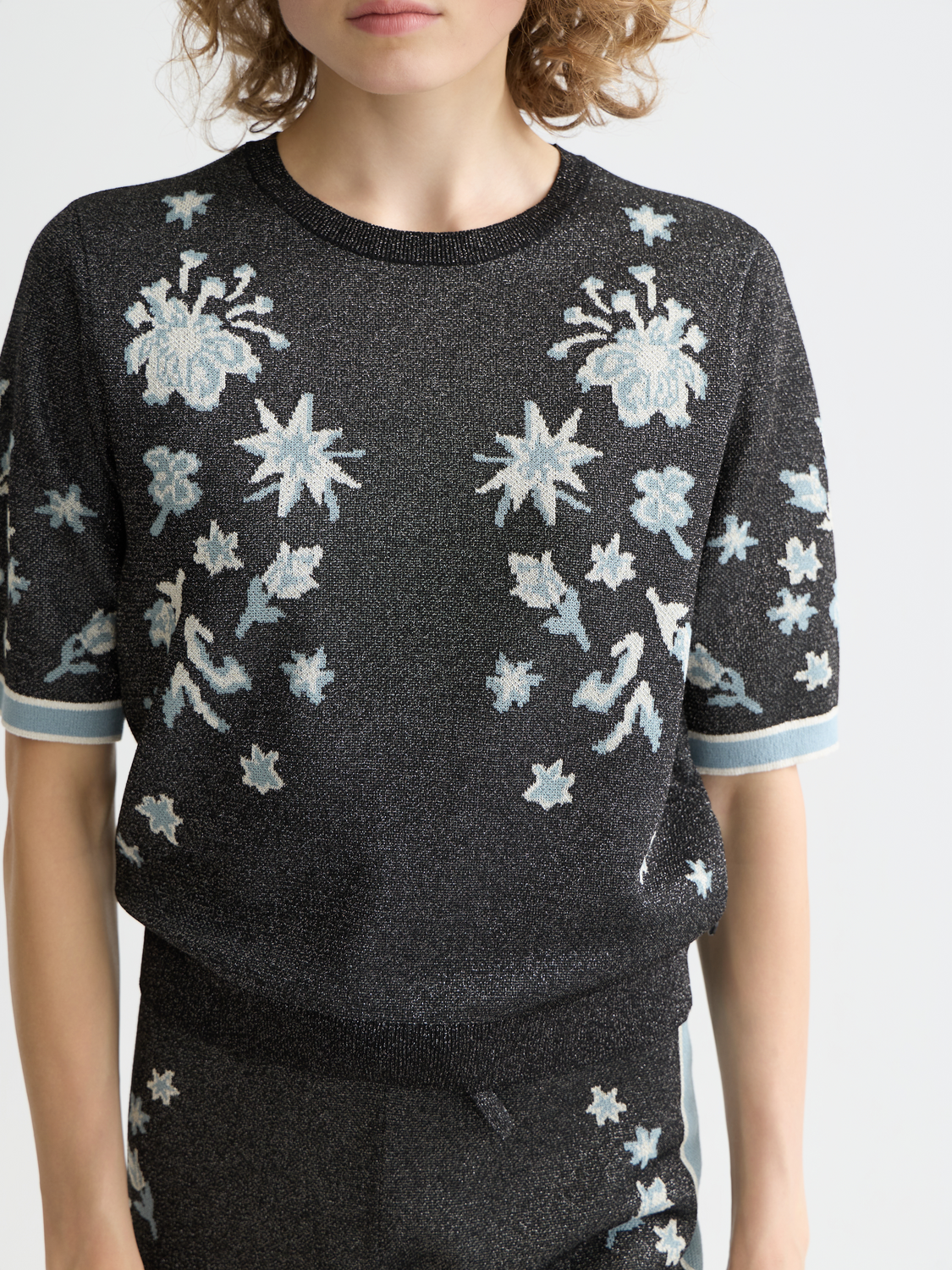 Jacquard short-sleeved knitwear top by Scotch & Soda featuring intricate woven patterns and a comfortable fit.
