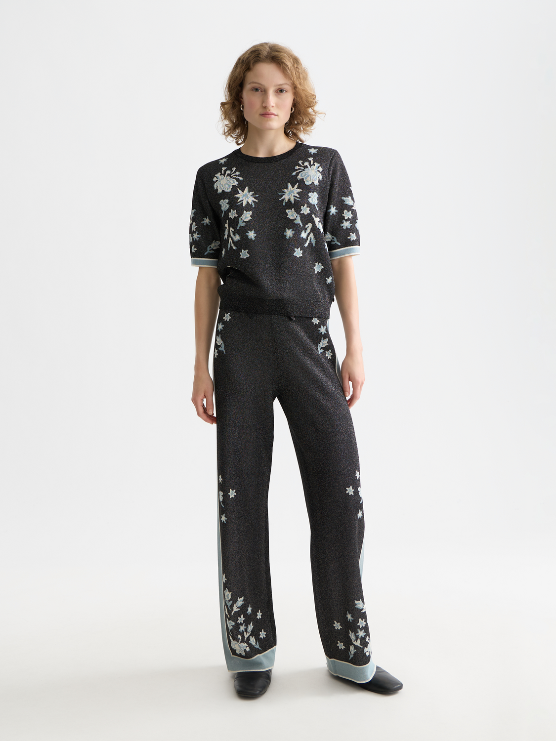 Jacquard short-sleeved knit top by Scotch & Soda featuring intricate woven patterns and a classic crew neckline.