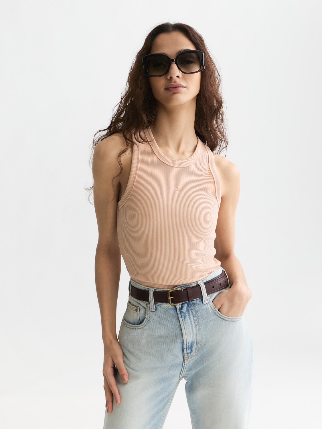 Scotch & Soda rib racer tank top in black, sleeveless design with ribbed fabric, laid flat on a white background.