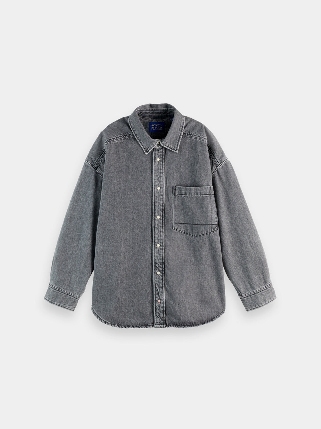 Long-sleeve washed denim overshirt by Scotch & Soda, featuring a casual fit and classic denim texture.