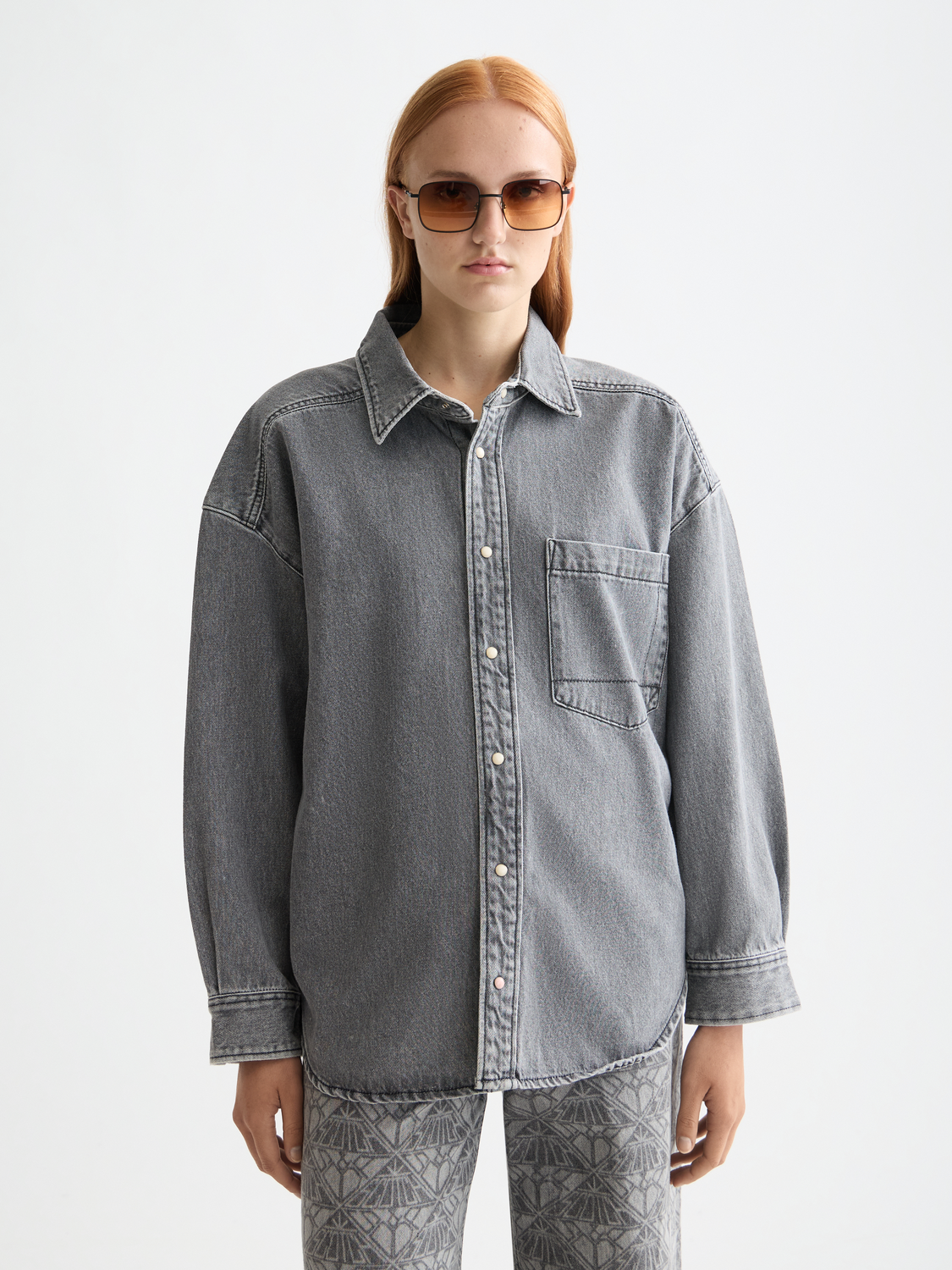 Long-sleeve washed denim overshirt by Scotch & Soda, featuring a casual fit and classic denim texture.