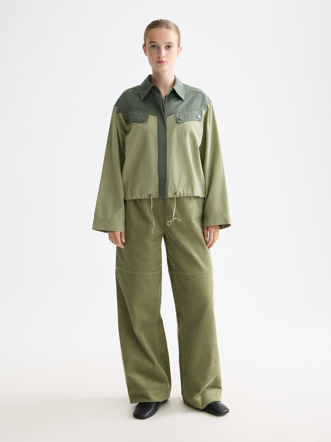 Long sleeve contrast color utility shirt by Scotch & Soda, featuring multiple pockets and a stylish design.