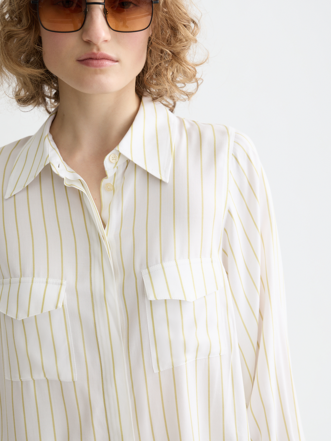 Long sleeve striped pocket shirt by Scotch & Soda, featuring a classic design with chest pocket and button closure.