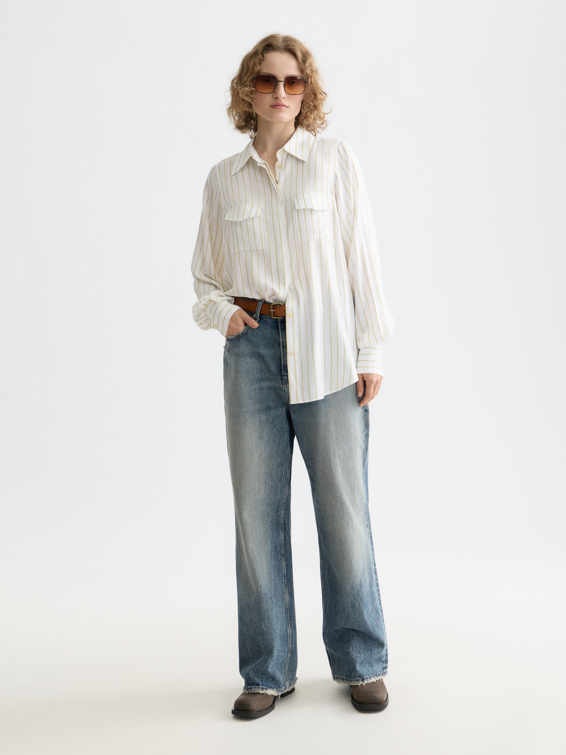 Long sleeve striped pocket shirt by Scotch & Soda featuring a classic button-up design and chest pocket.