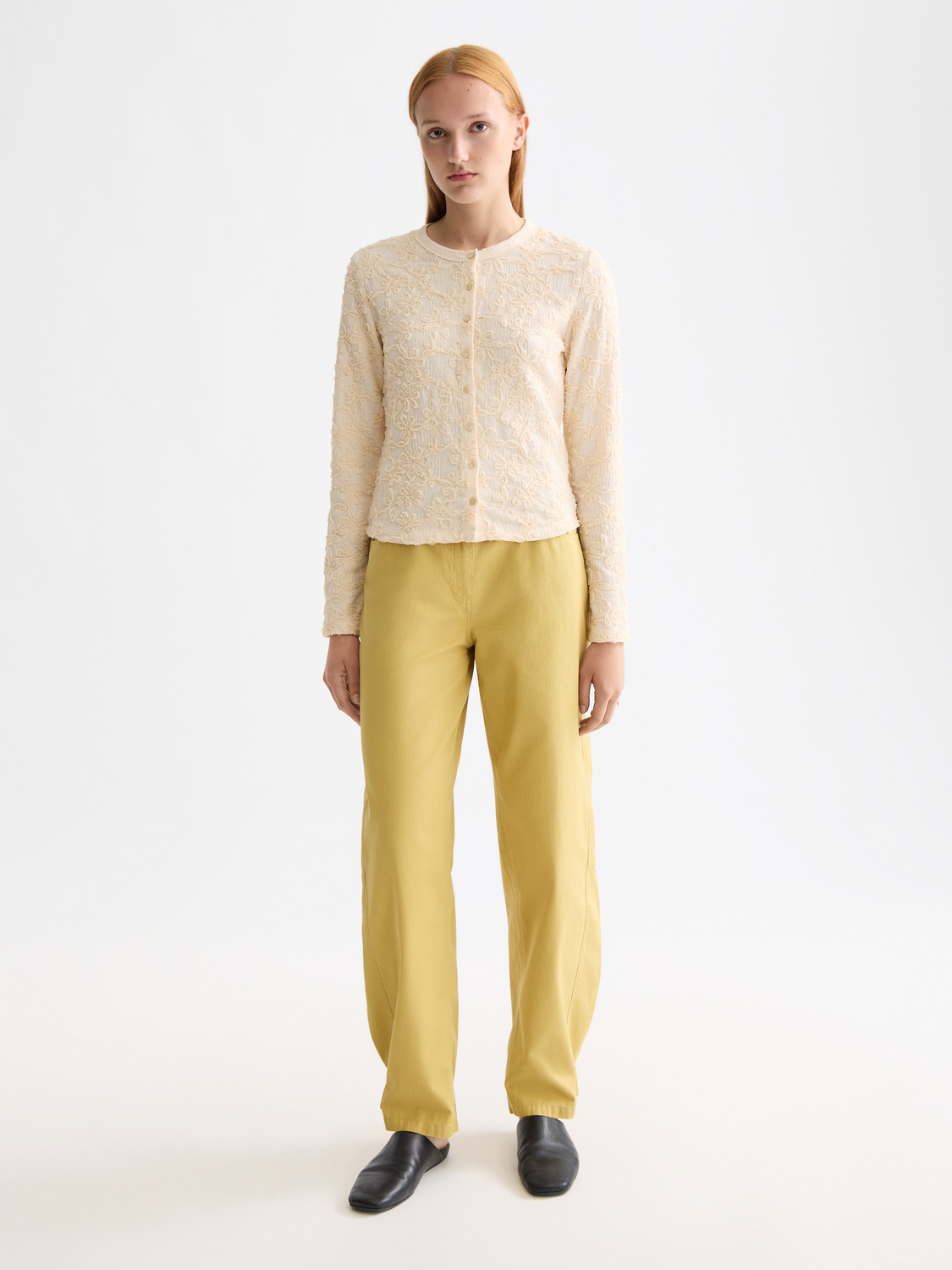 Long sleeve textured button-up top by Scotch & Soda, featuring a stylish collar and detailed fabric pattern.