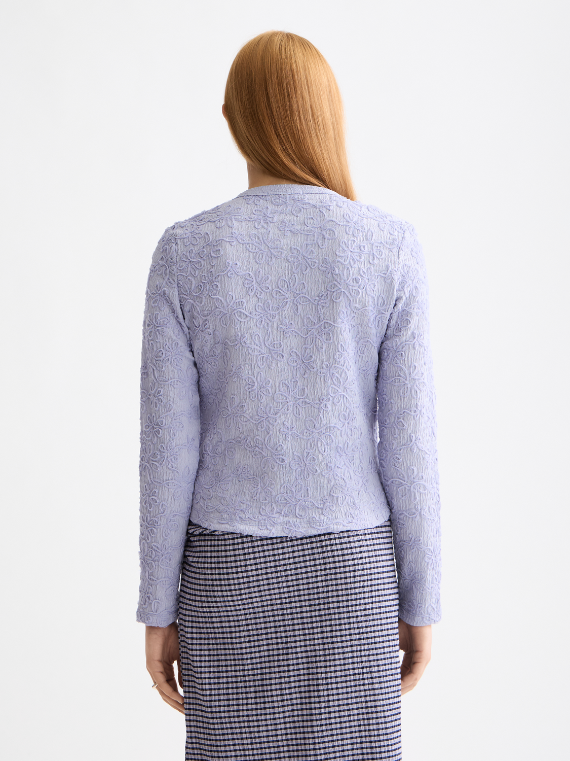 Long sleeve textured button-up top by Scotch & Soda, featuring a stylish collar and detailed fabric pattern.