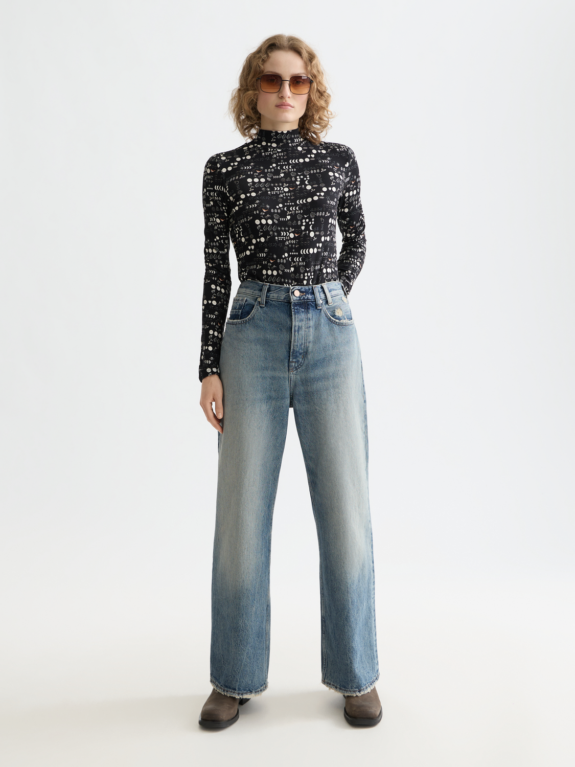 Long sleeve printed mock neck tee from Scotch & Soda featuring a stylish pattern and comfortable fit.