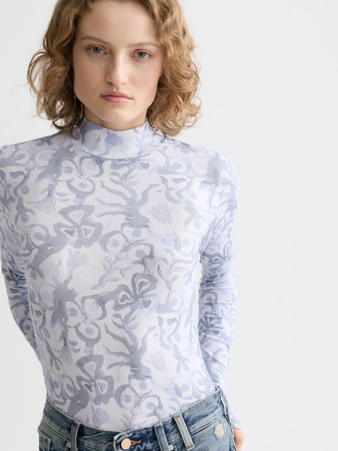 Long sleeve printed mock neck tee by Scotch & Soda featuring a stylish design and comfortable fit.