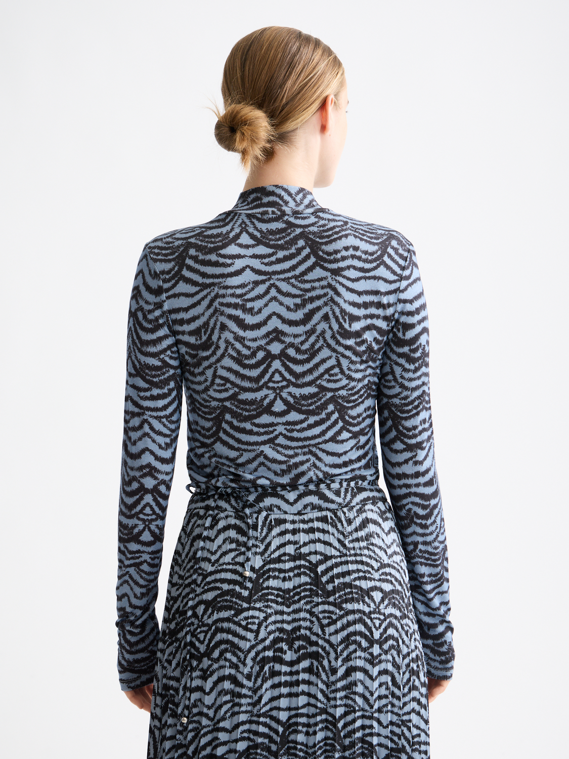 Long sleeve printed mock neck tee from Scotch & Soda, featuring a stylish design in black fabric.