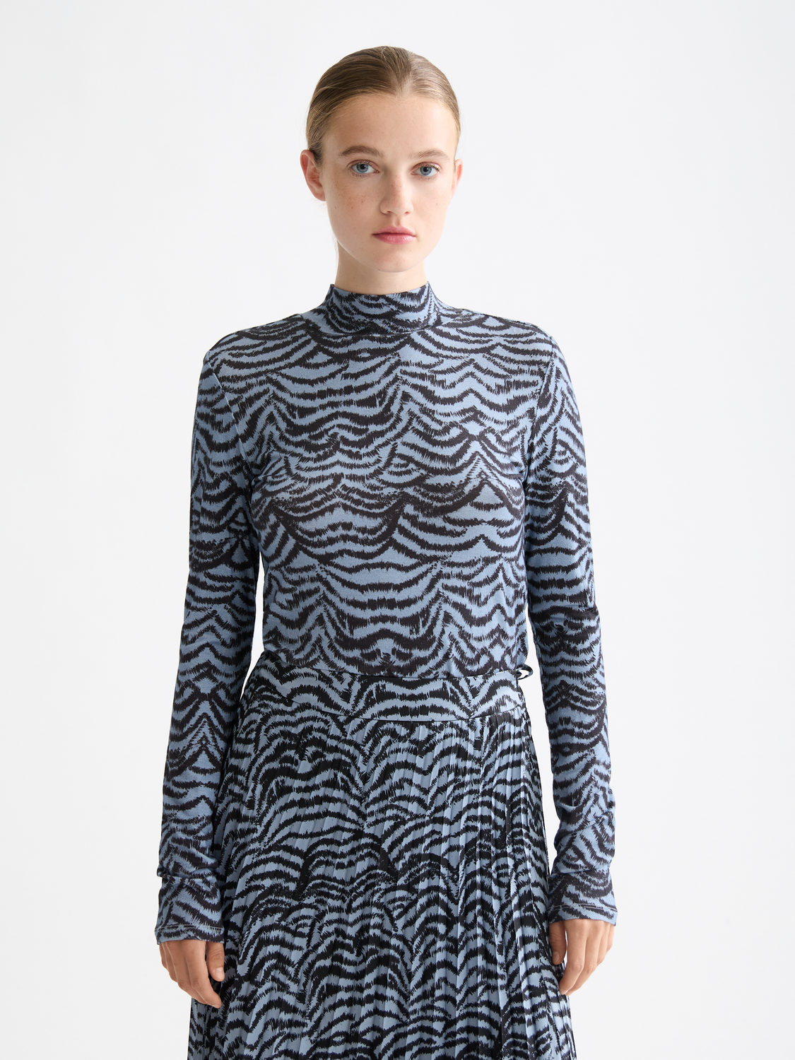 Printed Scotch & Soda long-sleeve mock neck tee with a stylish graphic design on soft fabric.