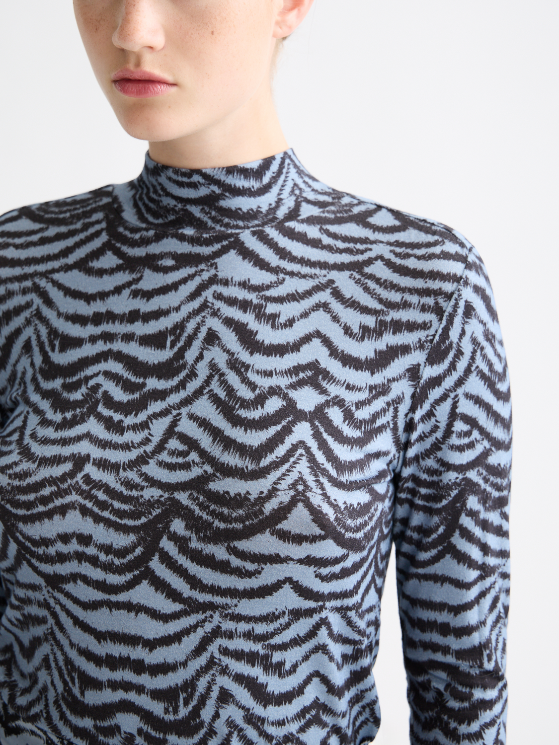 Printed Scotch & Soda long sleeve mock neck tee featuring a stylish graphic design on soft fabric.