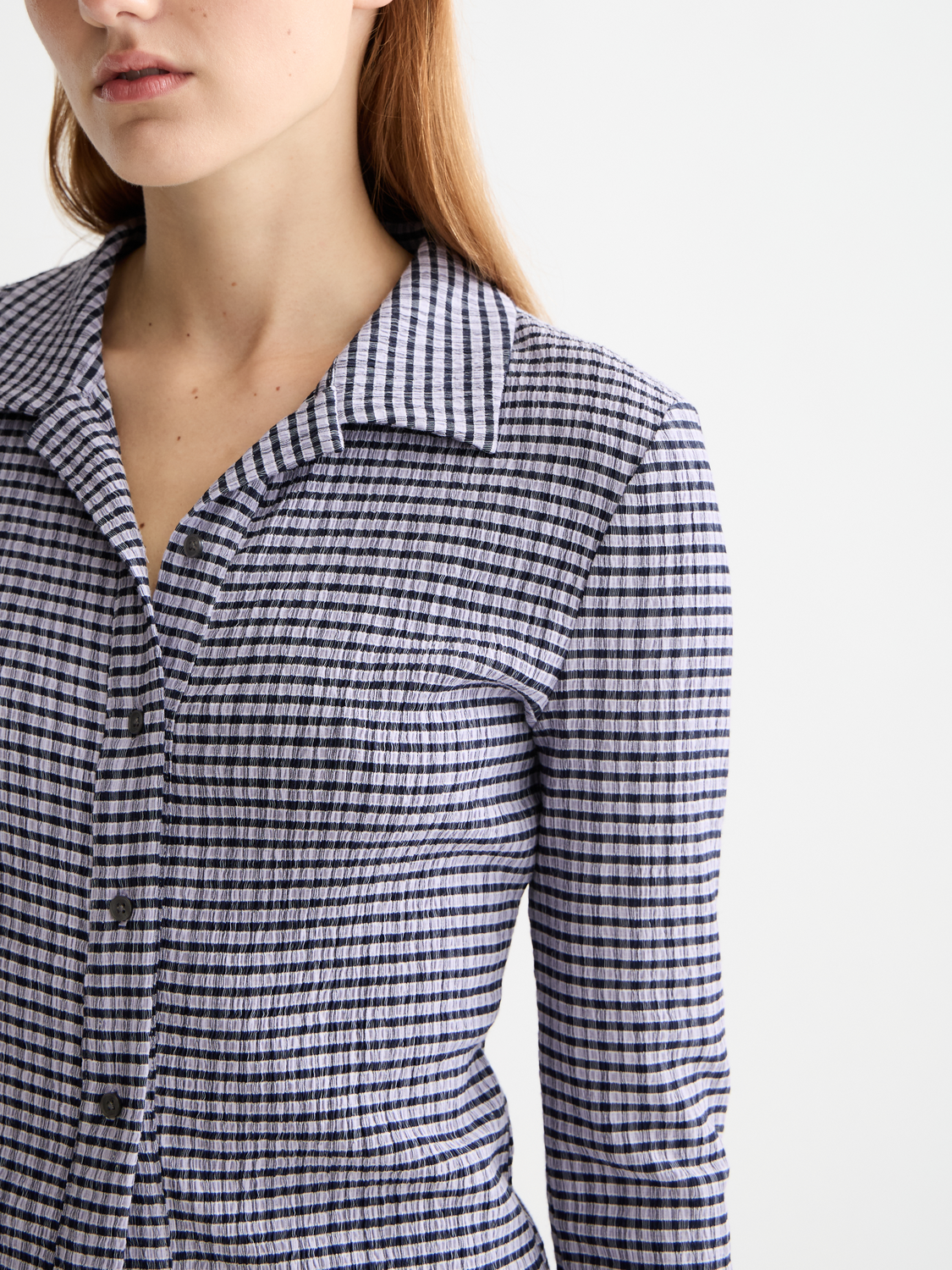 Long-sleeve gingham button-up top from Scotch & Soda, featuring a classic checkered pattern and tailored fit.