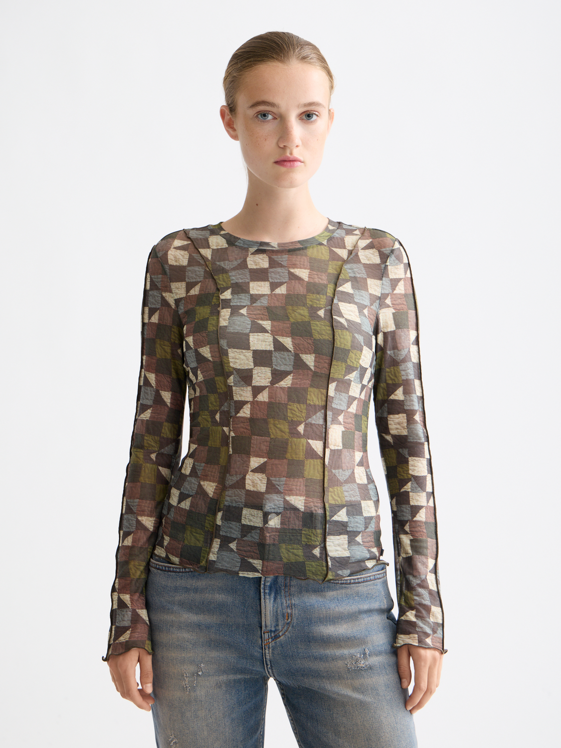 Black mesh long-sleeved Scotch & Soda T-shirt with a fitted design and subtle textured fabric.