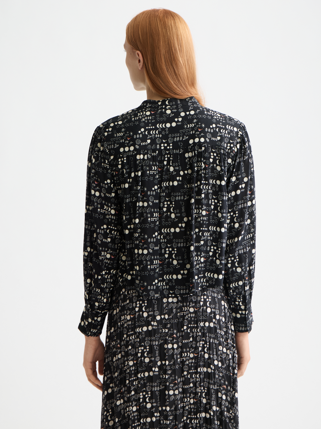 Printed pintuck woven shirt from Scotch & Soda with a relaxed fit and intricate detailing, displayed on a model.