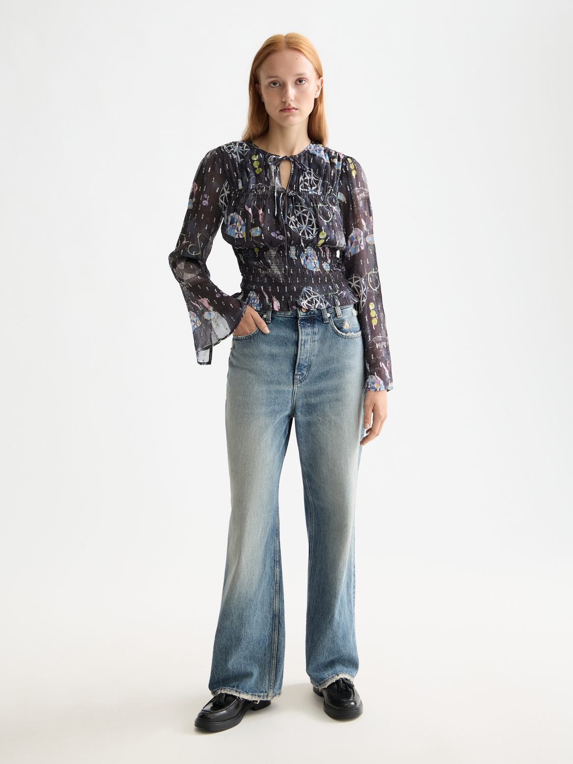 Woven smocked waist top by Scotch & Soda featuring a fitted silhouette and intricate fabric details.