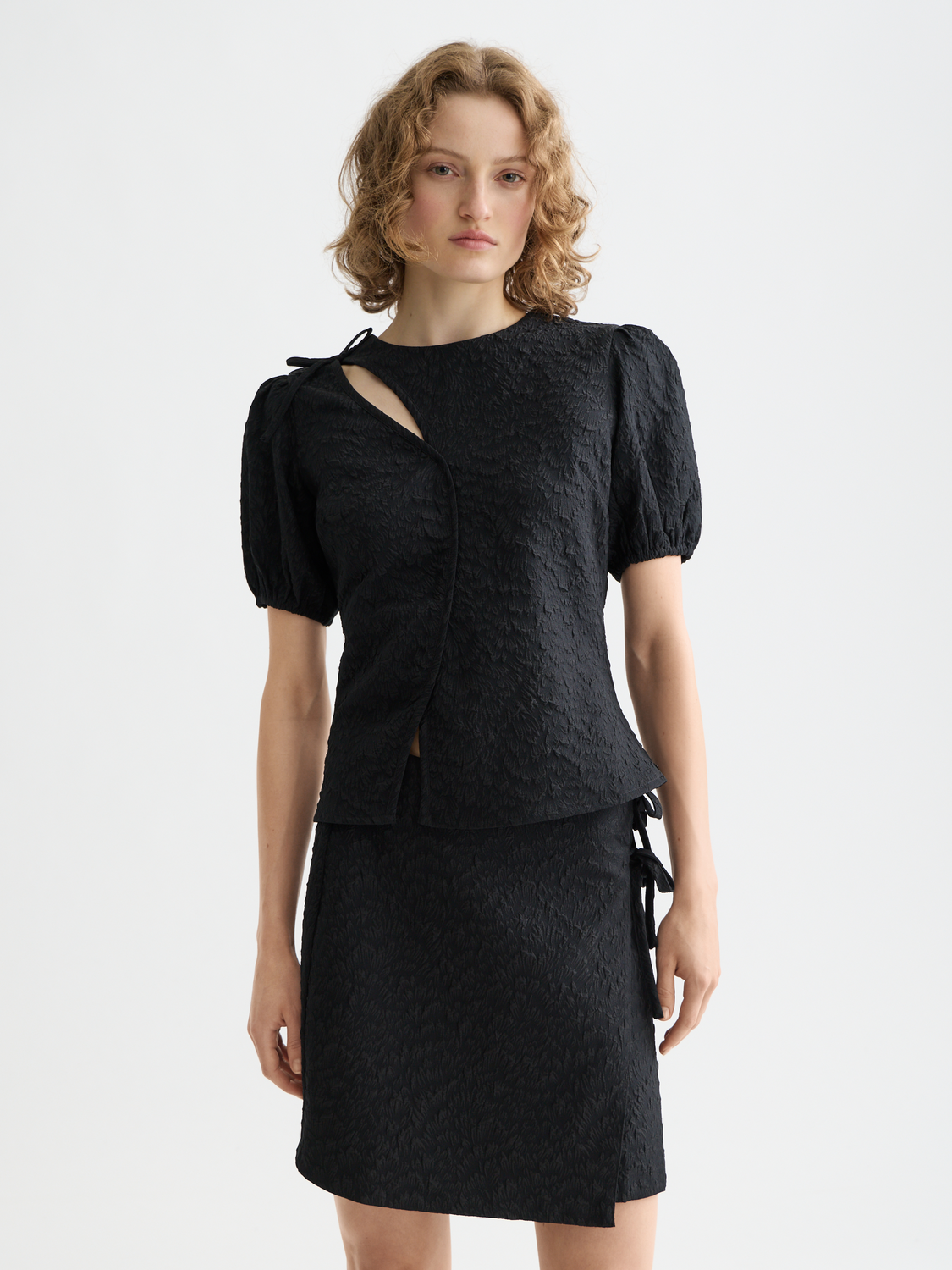 Woven top with puff sleeves in textured fabric by Scotch & Soda, featuring a stylish and trendy design.