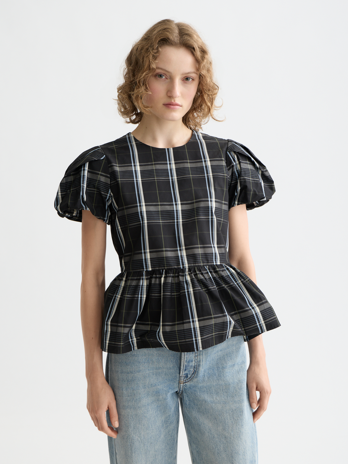 Woven taffeta peplum top by Scotch & Soda featuring a fitted silhouette and structured design, shown in a neutral color.