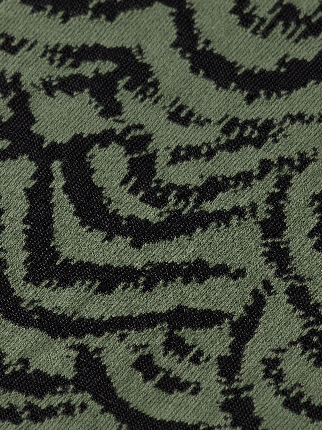 SCOTCH & SODA jacquard v-neck pullover, stylish knitwear with intricate pattern and a comfortable fit, shown on a model.