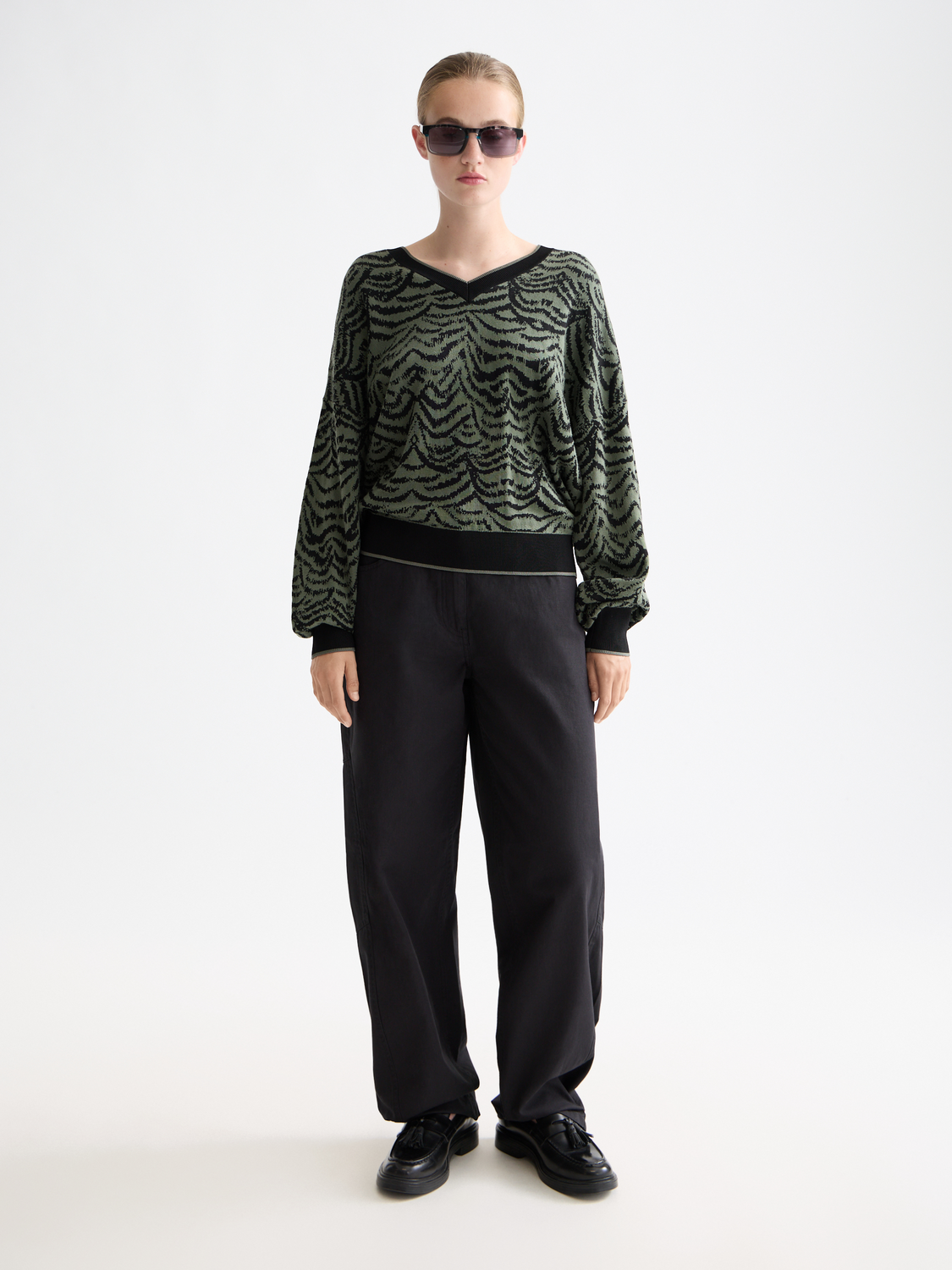 SCOTCH & SODA jacquard v-neck pullover, knitted knitwear with intricate pattern, displayed on a model.