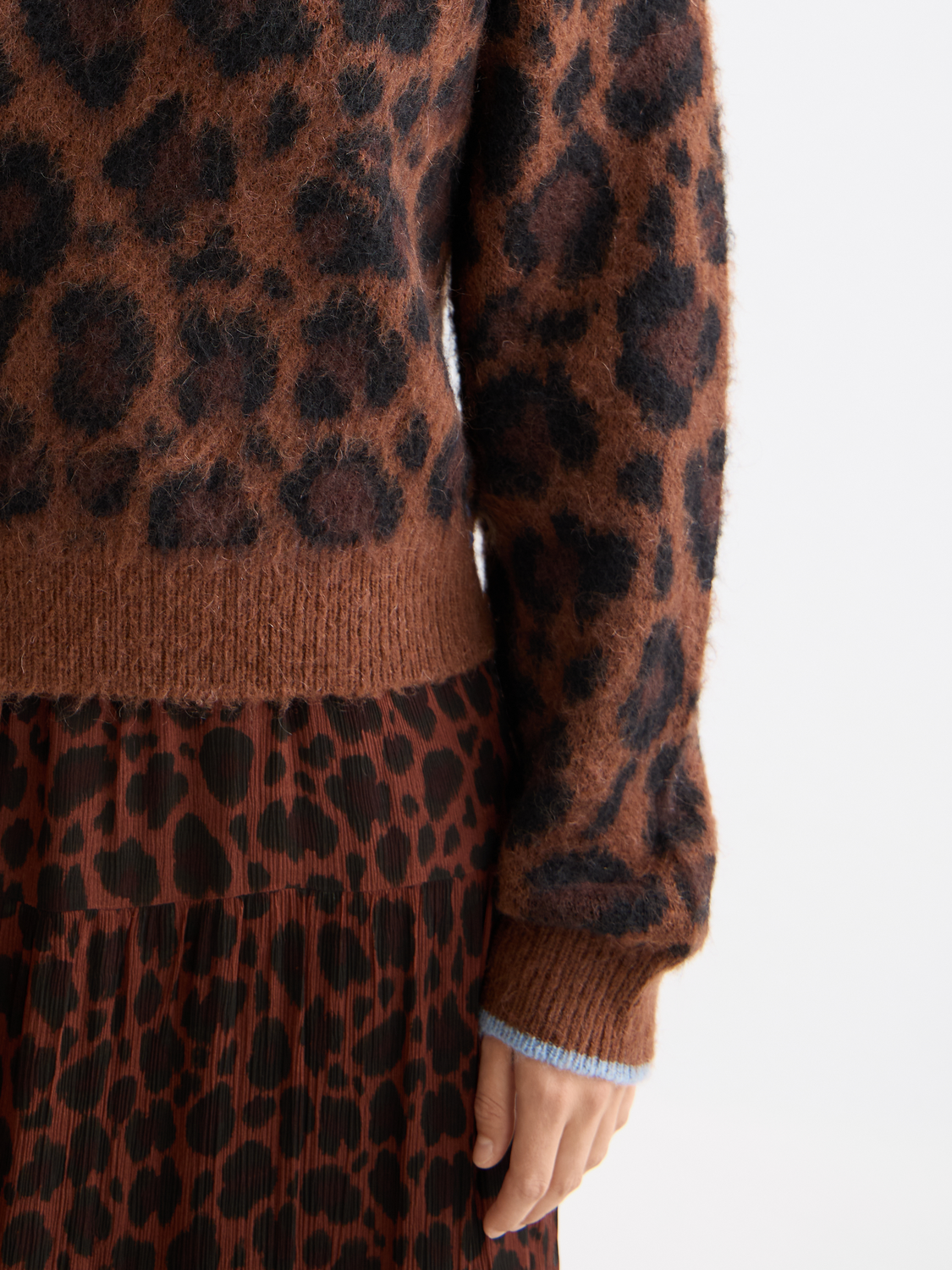 Fuzzy jacquard knitwear pullover by Scotch & Soda featuring intricate patterns and cozy texture.