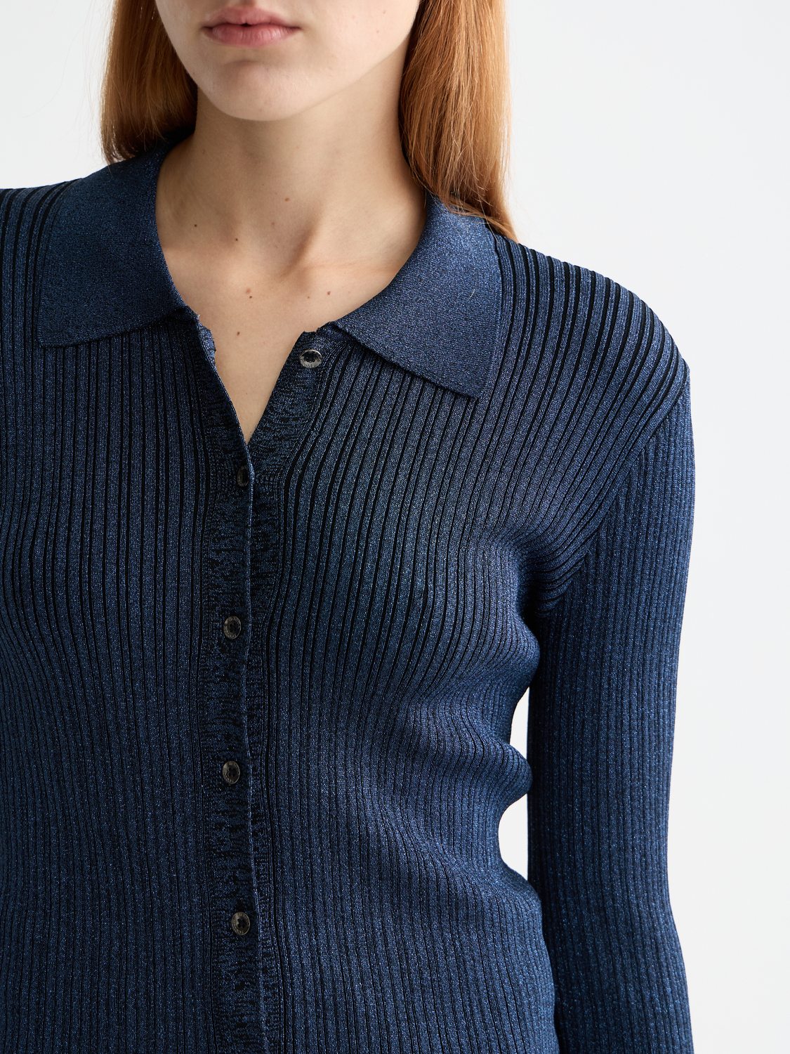 Metallic fitted button-up knitwear top from Scotch & Soda, featuring a shiny metallic finish and classic collar design.