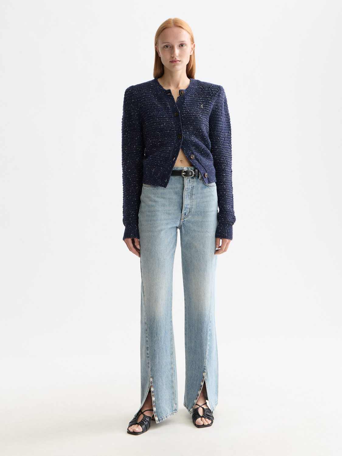 Metallic crewneck cardigan by Scotch & Soda, soft knitwear with a shimmering metallic finish, displayed on a neutral background.