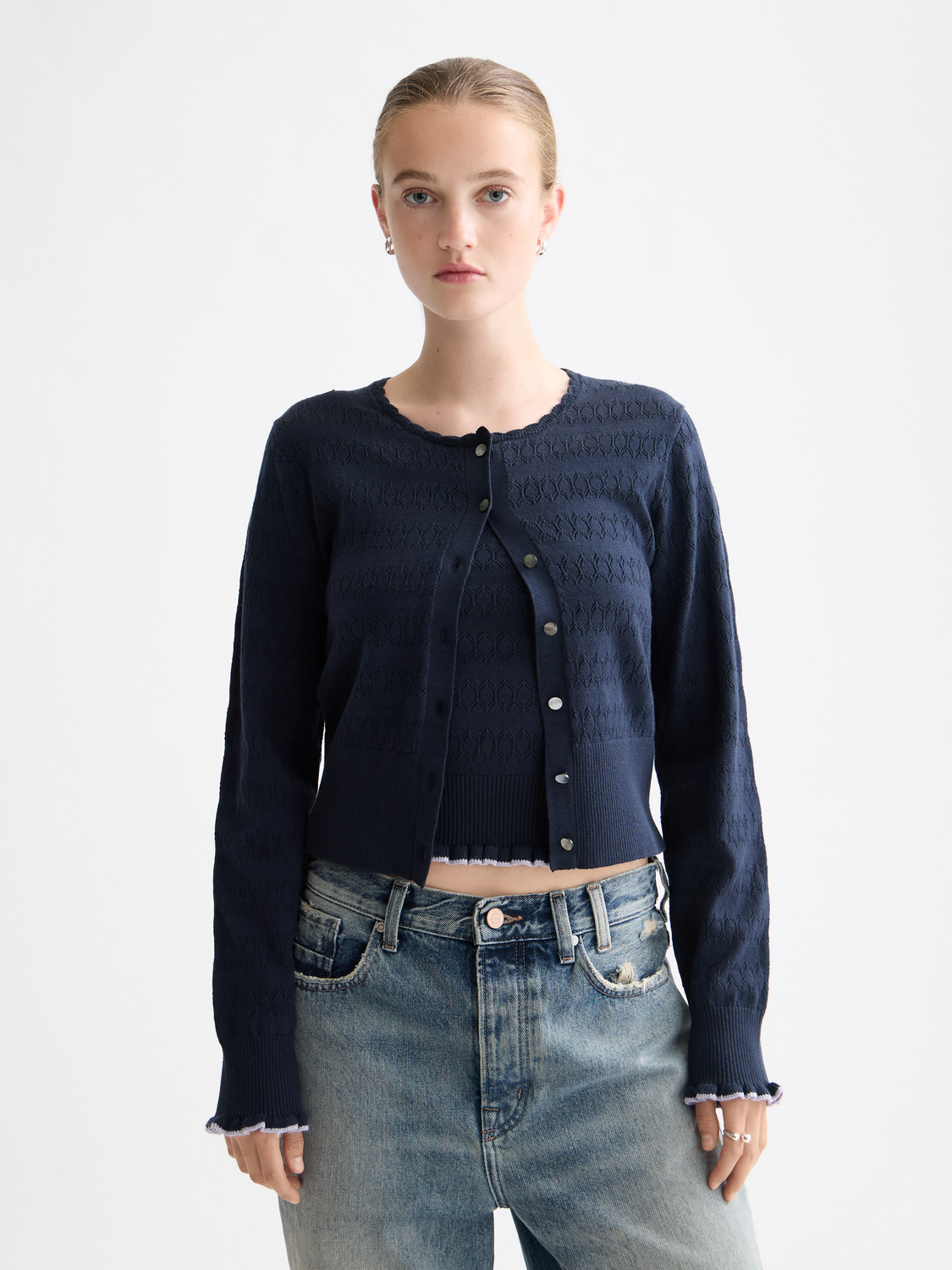 Pointelle knitted cardigan by Scotch & Soda, featuring delicate knit pattern and soft fabric in a stylish, versatile design.