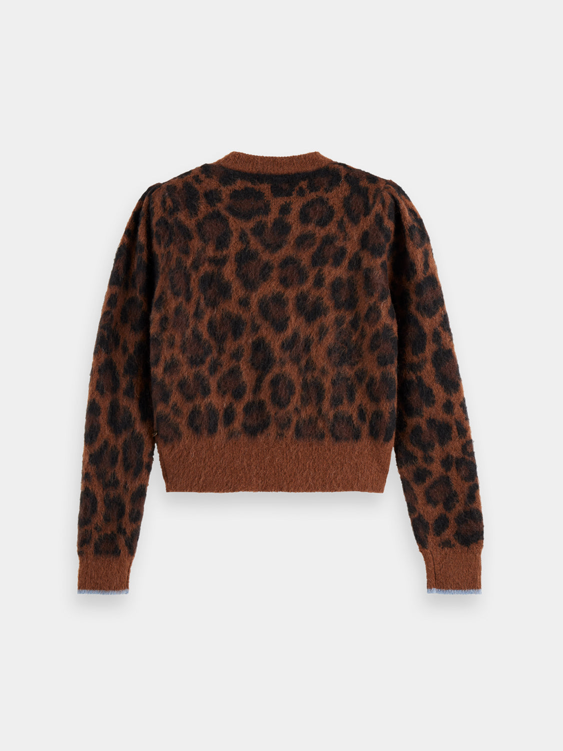 Fuzzy jacquard knit cardigan by Scotch & Soda with intricate pattern, cozy texture, and button closure in dark color.
