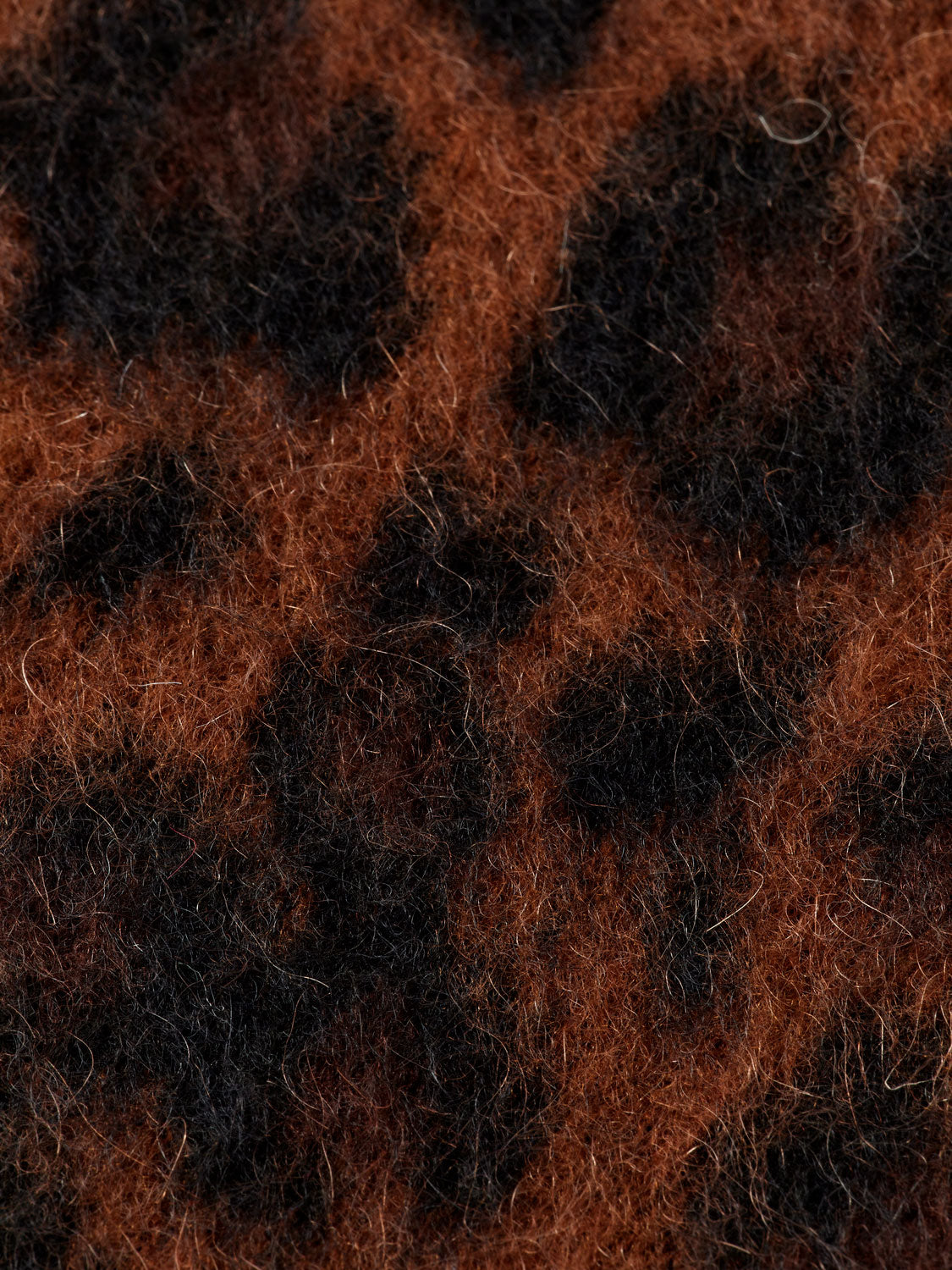 Fuzzy jacquard cardigan by Scotch & Soda featuring cozy knitwear with intricate pattern and soft texture.