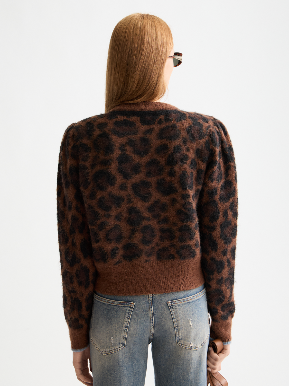 Fuzzy jacquard knit cardigan by Scotch & Soda featuring intricate patterns and a cozy, textured design in soft shades.