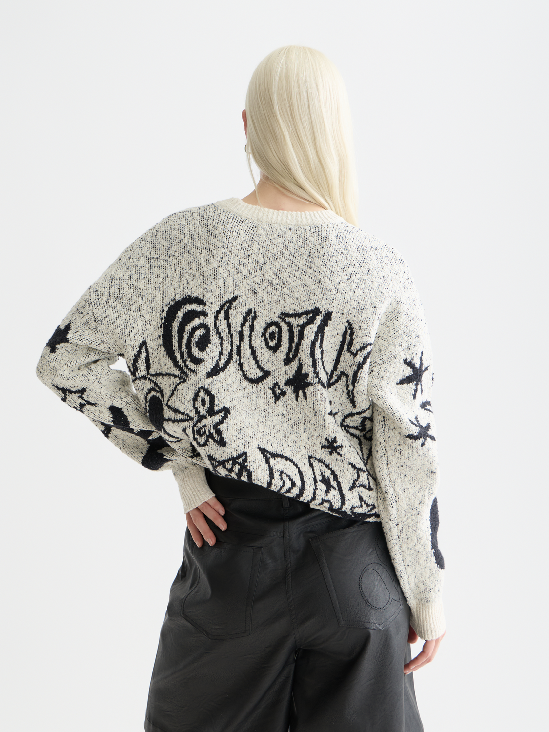 SCOTCH & SODA jacquard knitwear pullover, front view showcasing intricate woven pattern and cozy knit texture.