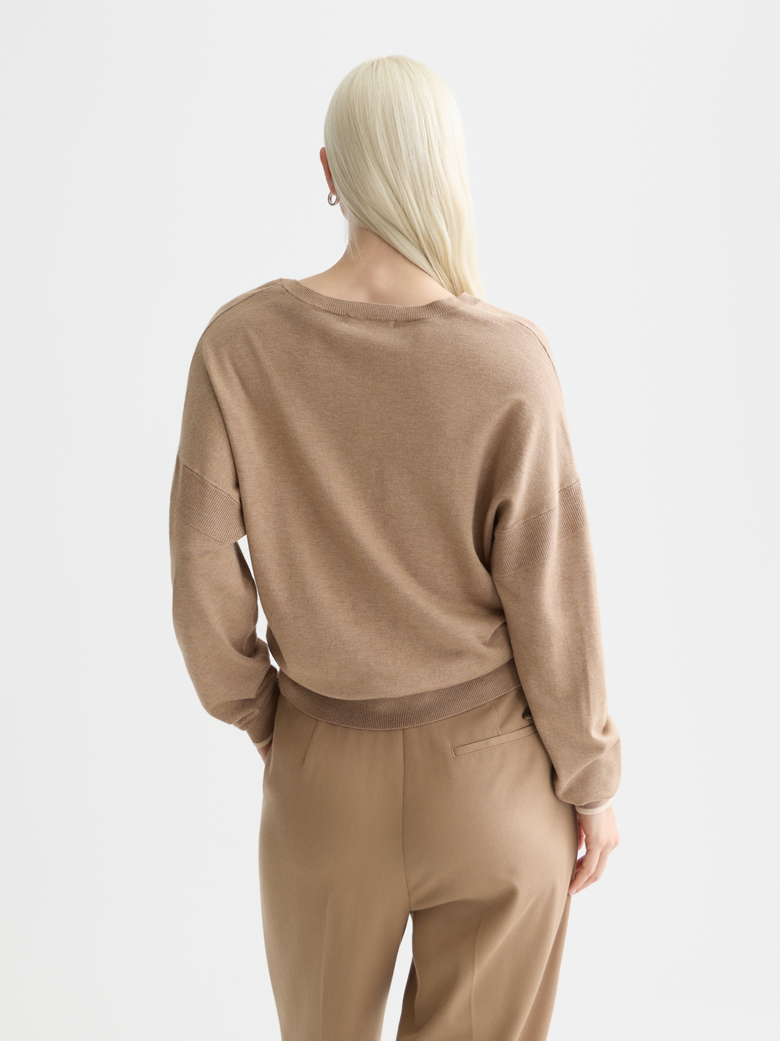 Back view of a relaxed-fit V-neck knit pullover by Scotch & Soda, showing soft fabric and casual style.