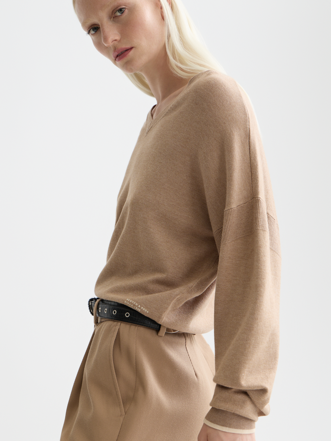 Relaxed-fit V-neck knit pullover by Scotch & Soda, showing soft fabric and casual style in a neutral color.