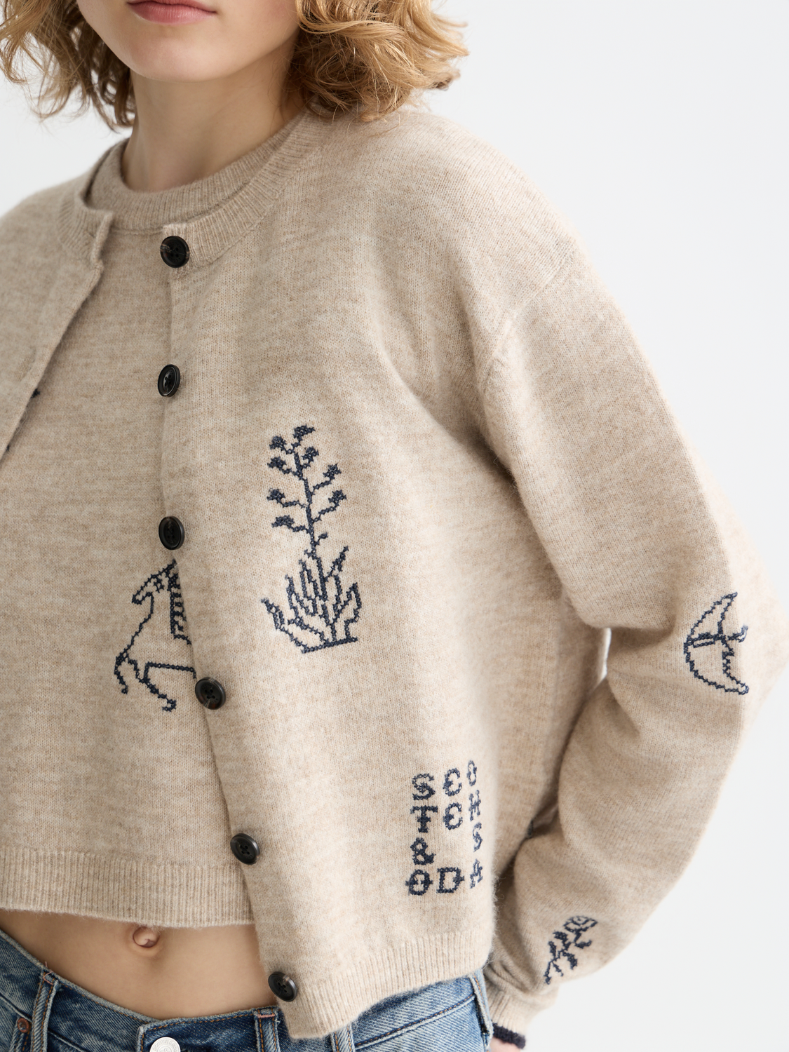 Embroidered crew neck cardigan by Scotch & Soda, stylish knitwear with intricate embroidery, cozy and fashionable for casual wear.