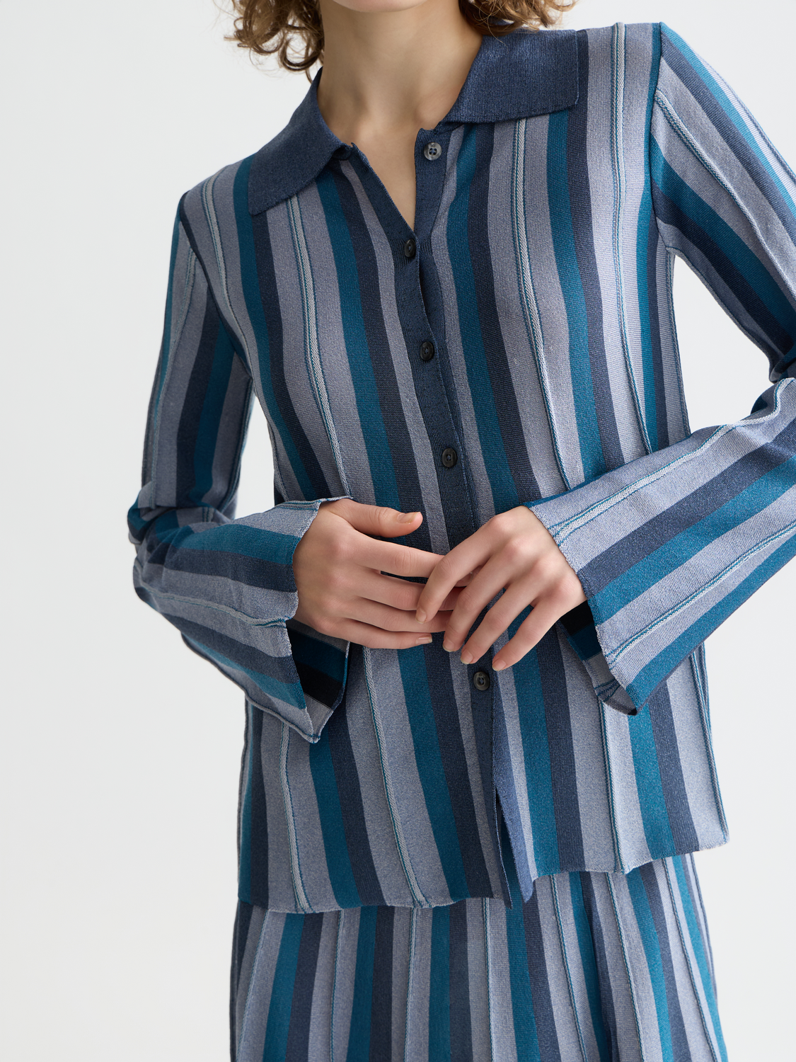 Scotch & Soda collared knit cardigan with button closure, featuring a classic design and soft fabric for a stylish layered look.