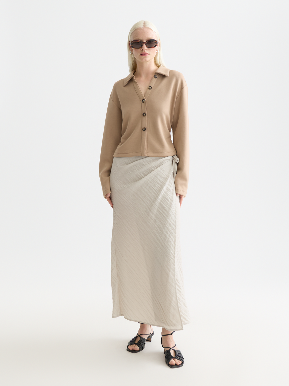 Long-sleeve modal shirt by Scotch & Soda featuring a classic fit and soft fabric, displayed on a hanger against a neutral background.