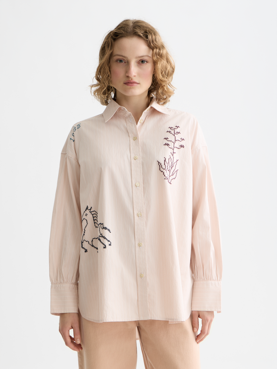 Long sleeve embroidered girlfriend shirt by Scotch & Soda, featuring detailed floral embroidery on soft fabric.