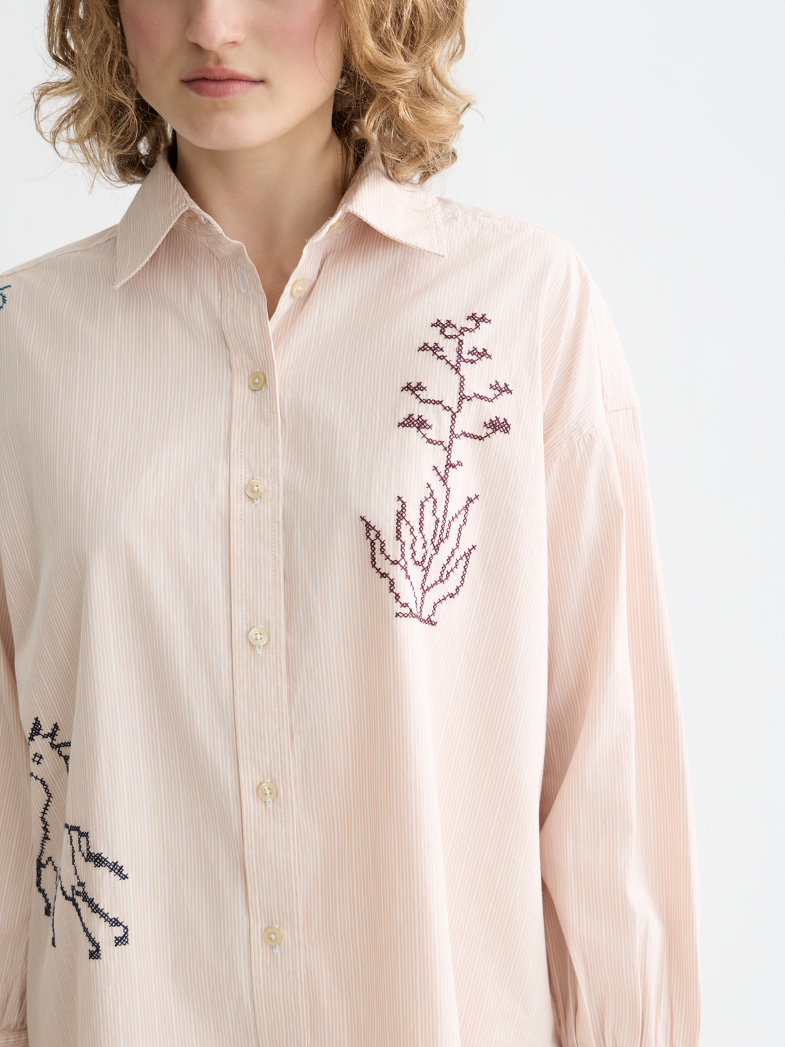 Long sleeve embroidered girlfriend shirt by Scotch & Soda, featuring detailed floral embroidery on soft fabric.