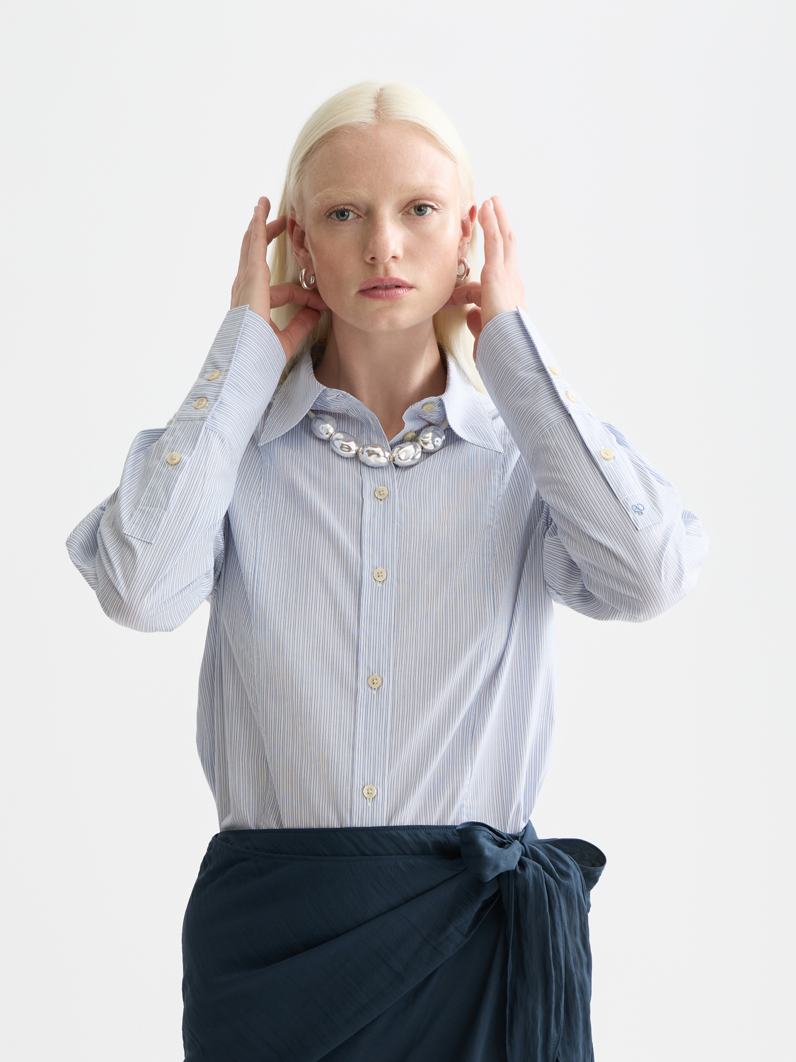 Long-sleeve Scotch & Soda poplin shirt with a classic button-down design, featuring a structured fit and crisp fabric.