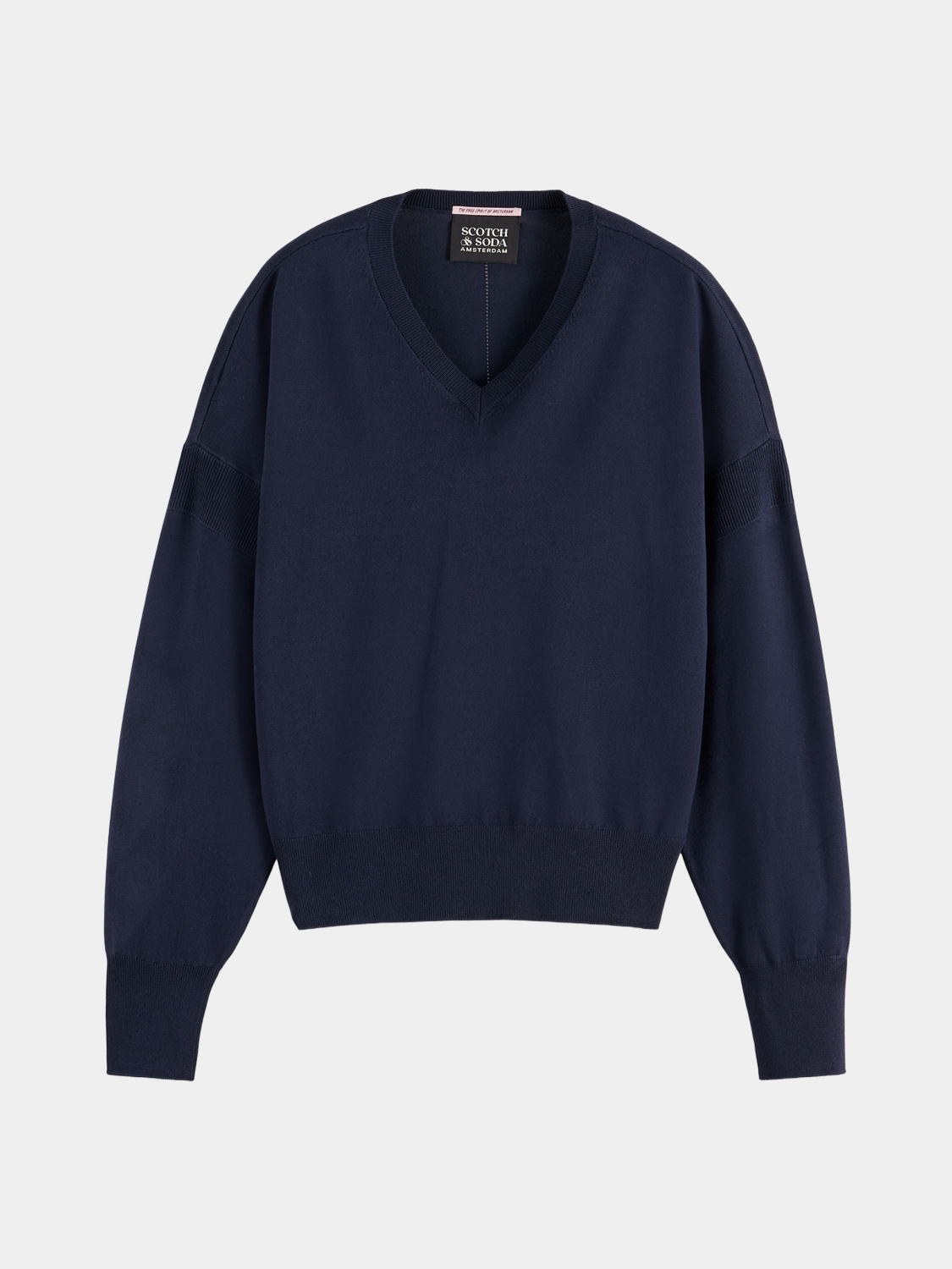 Scotch & Soda V-neck relaxed fit knit pullover showing soft fabric and casual style on a mannequin.