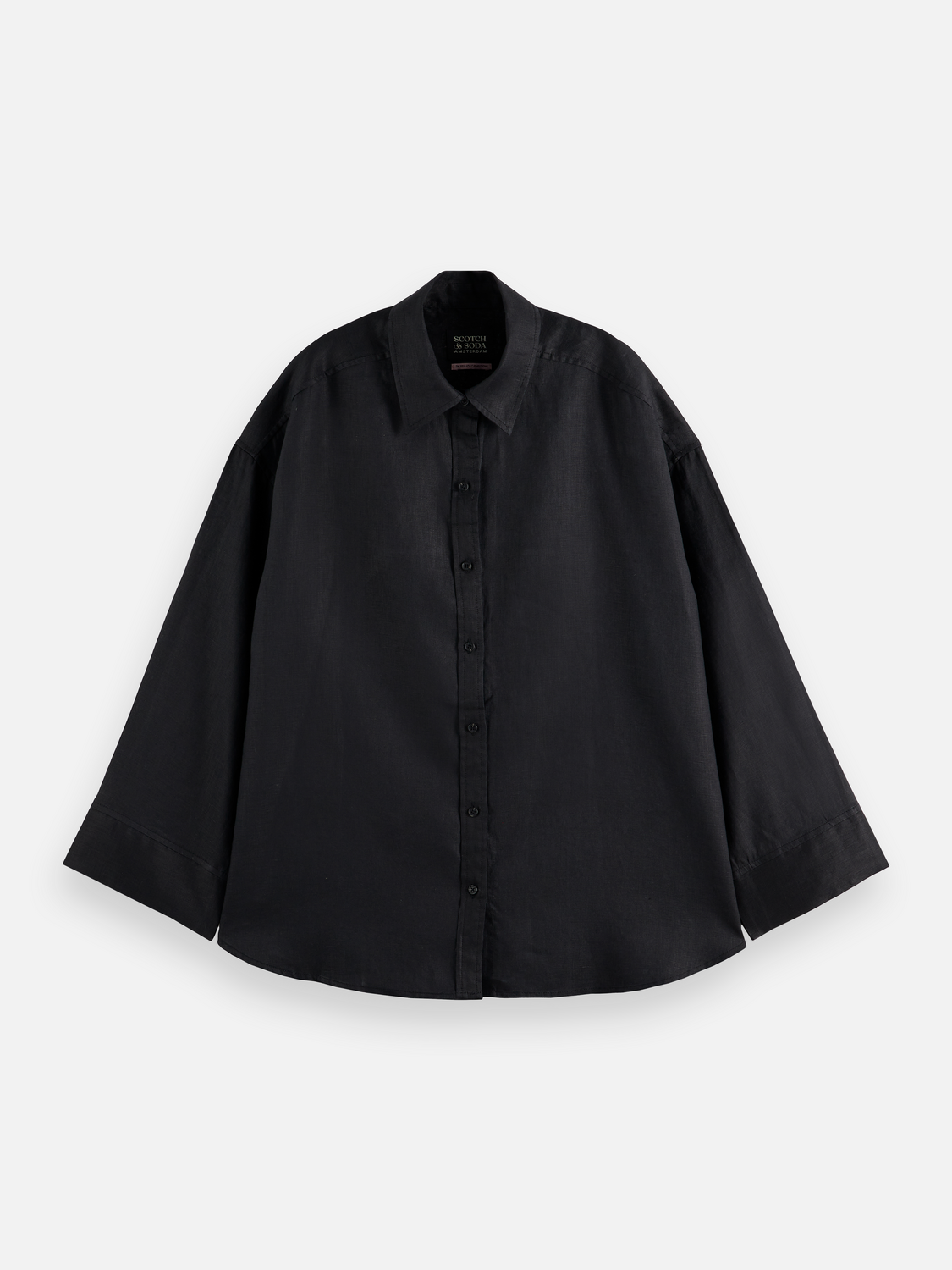 Long-sleeve linen shirt by Scotch & Soda, showing a light, breathable fabric with a relaxed fit and classic collar.