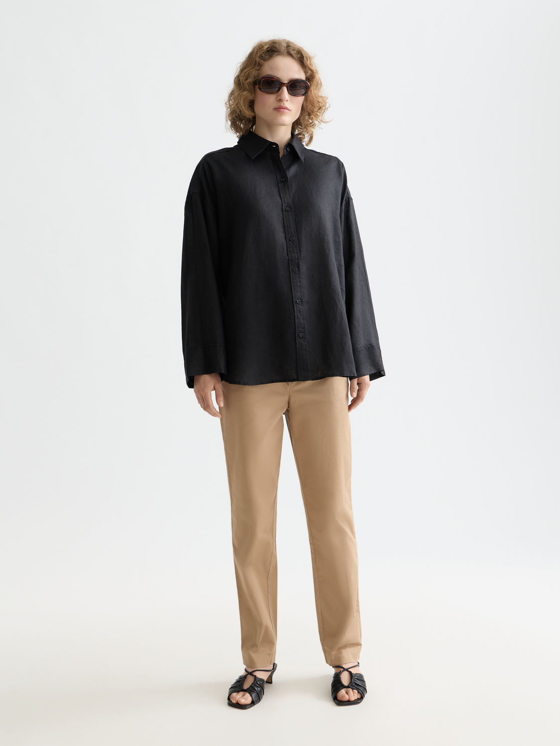 Light beige Scotch & Soda long sleeve linen shirt displayed on a model, featuring a relaxed fit and classic collar.