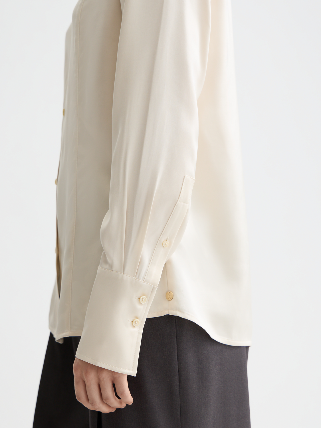 Long-sleeve satin shirt by Scotch & Soda, featuring a smooth, shiny fabric and classic collar, displayed flat on a white background.
