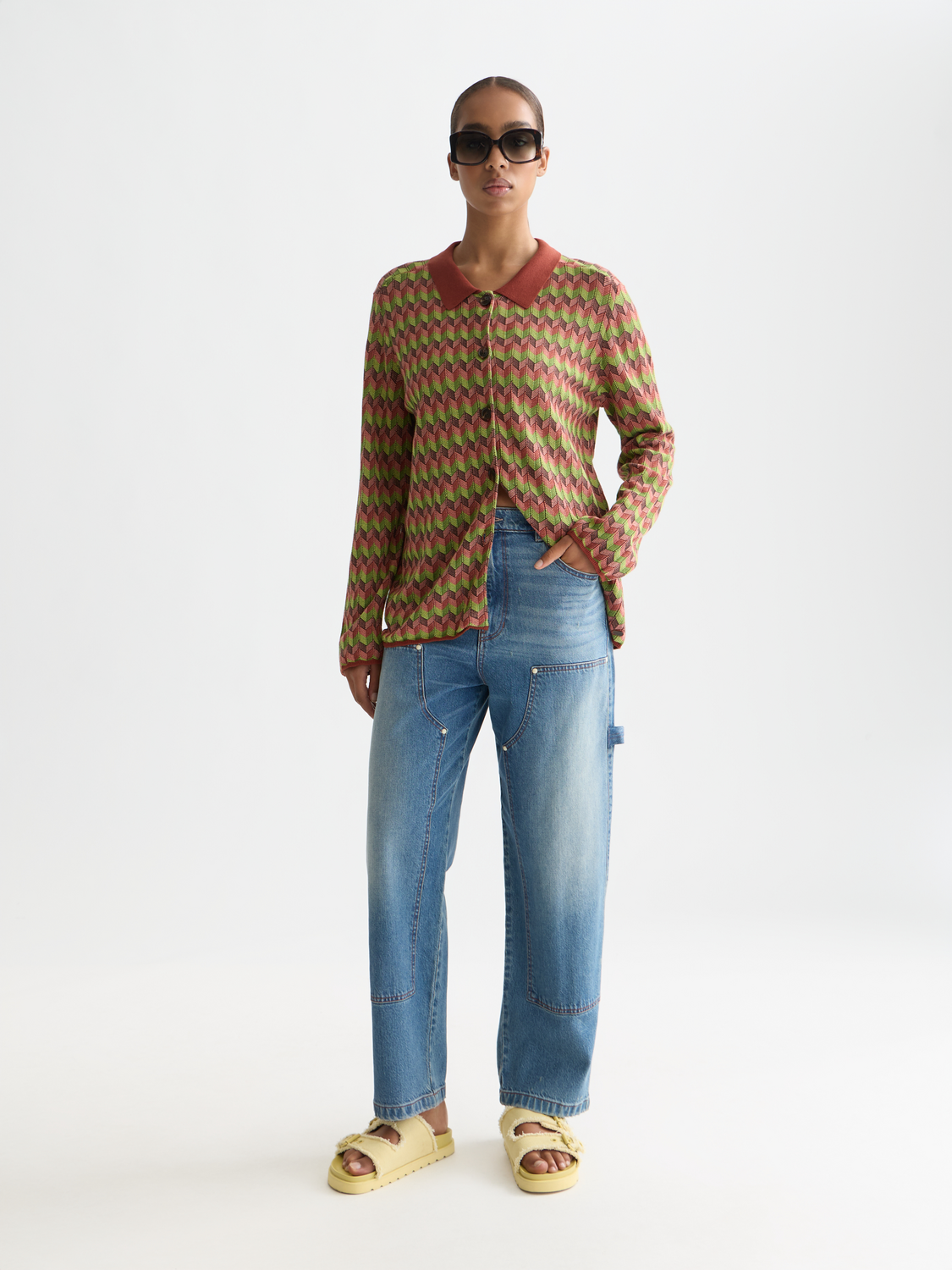 Jacquard knitted jacket by Scotch & Soda, featuring intricate woven patterns and a stylish fit, displayed on a model.
