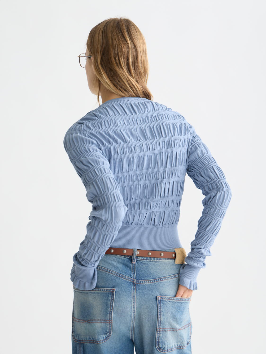Scotch & Soda smock stitch knit cardigan with back view, featuring textured stitch pattern and relaxed fit in neutral color.