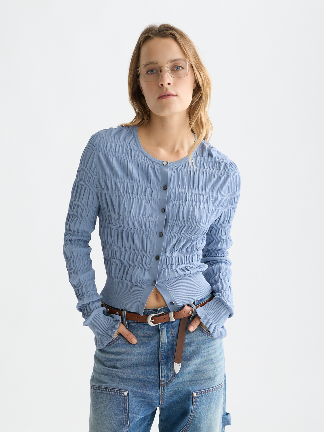 Scotch & Soda knitwear smock stitch cardigan with a textured pattern and button closure, displayed on a neutral background.