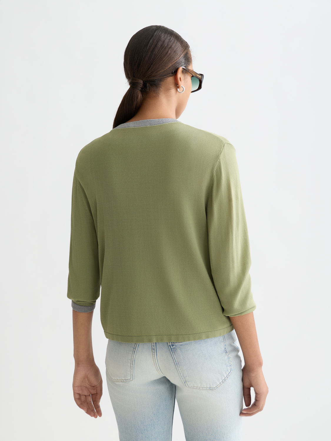 SCOTCH & SODA crewneck cardigan, knitwear with ribbed cuffs and hem, shown from the back in a close-up view.