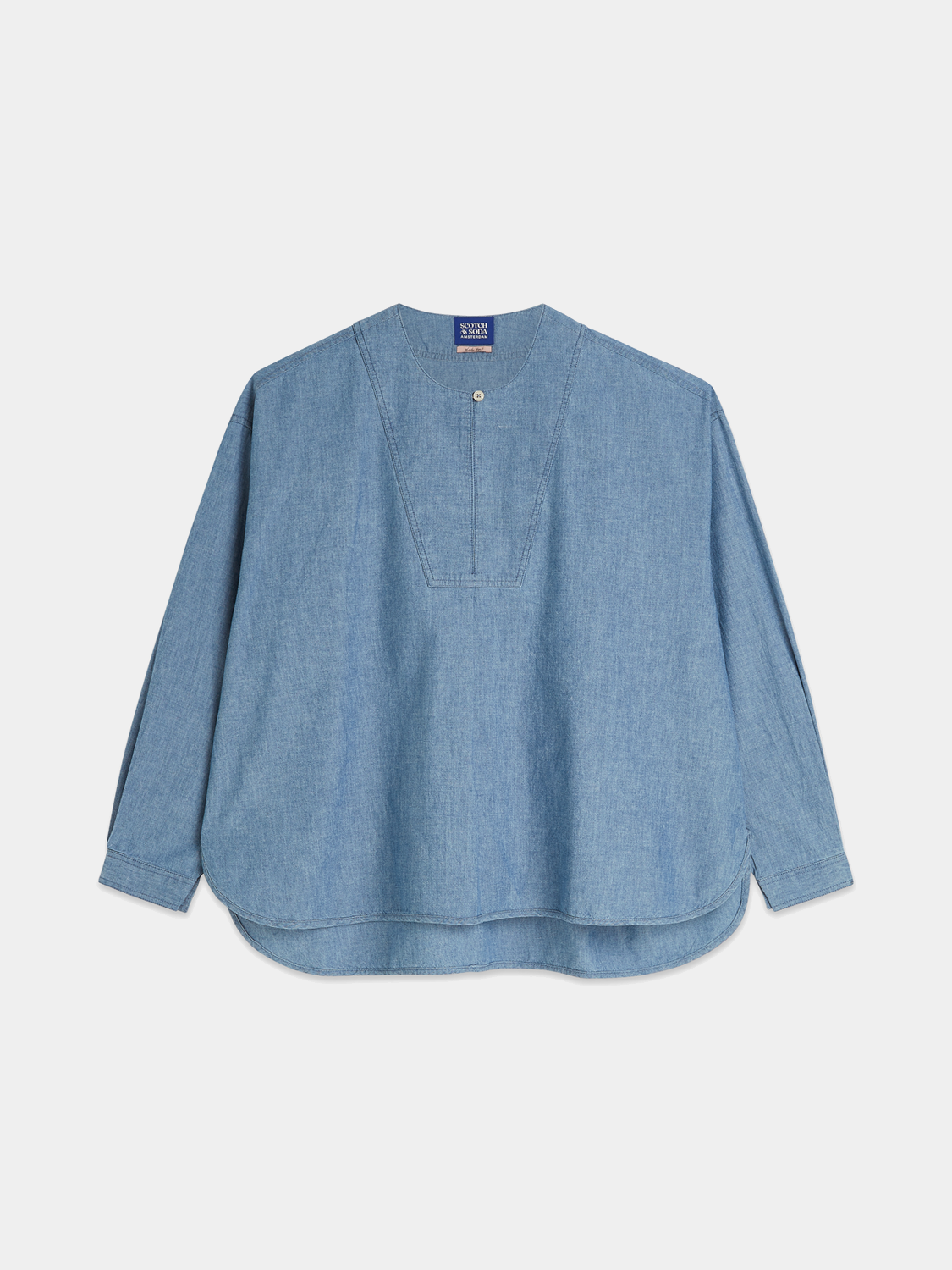 Denim bib shirt woven top by Scotch & Soda featuring a classic denim design with bib detail and button closure.